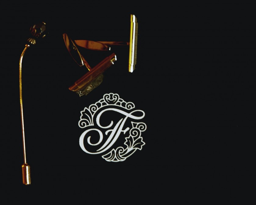 cuffling with fairmont logo on table