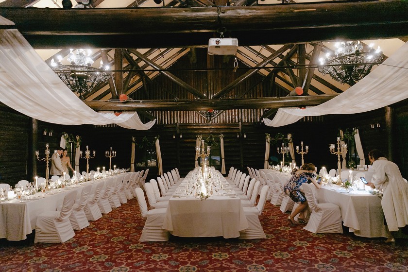 Heritage room winter decor setup with drapery white candle lit Montebello winter wedding photographers Eva Hadhazy