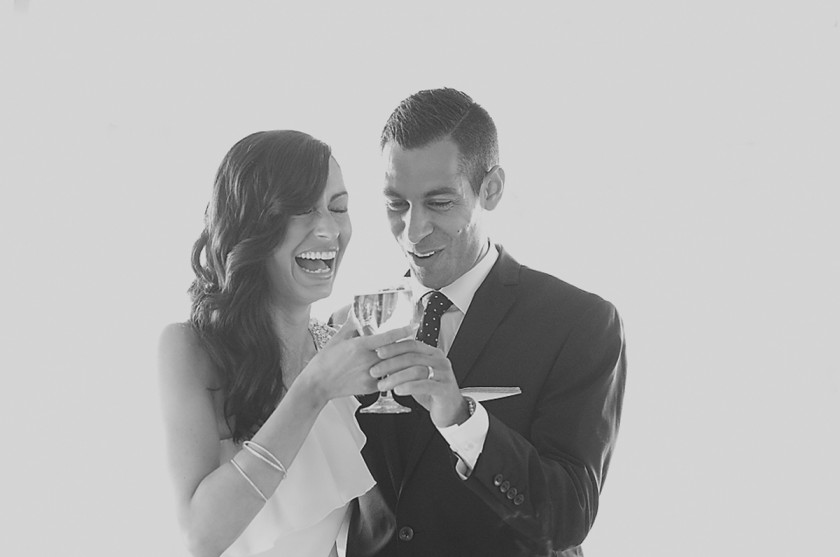 Wedding couple toasts, ottawa wedding photographers