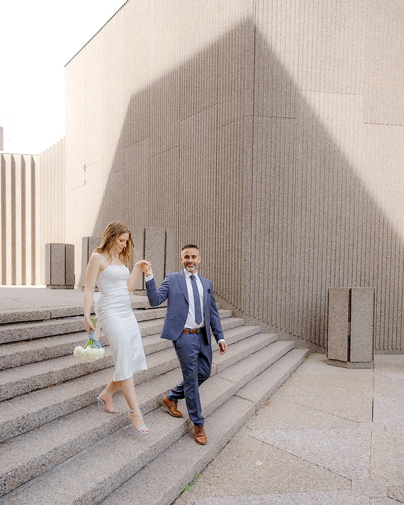 Couple walking towards camera casually NAC Ottawa