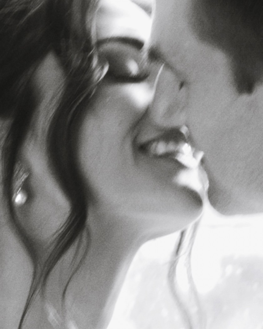 closeup of a couple kissing on their wedding day. ottawa editorial wedding photographers Eva Hadhazy