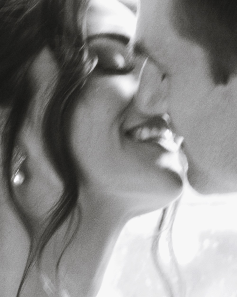 closeup of a couple kissing on their wedding day. ottawa editorial wedding photographers Eva Hadhazy