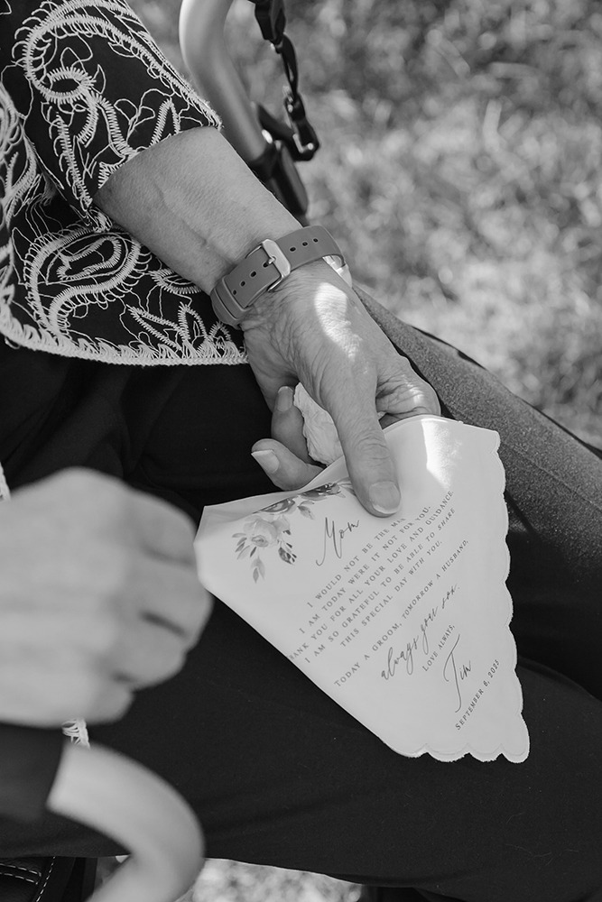 closeup of mom's hand who is holding a handkierchief in her hand