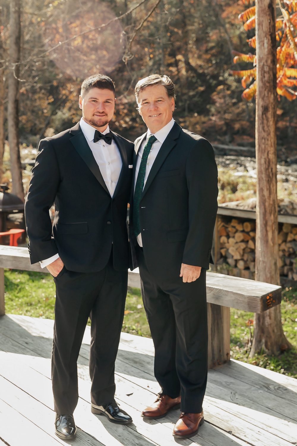 Jamie smiling with his father before the ceremony