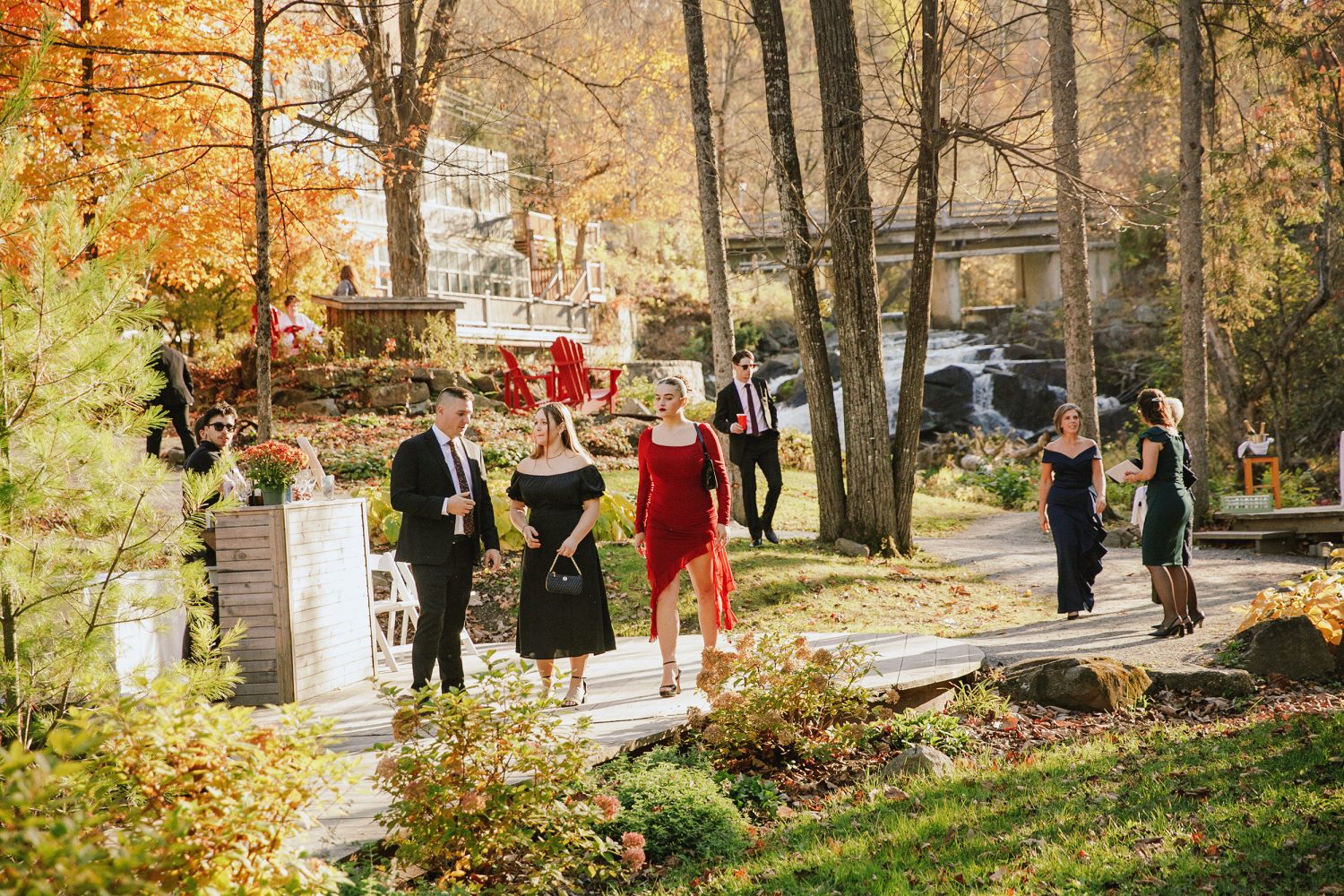 Guests arriving for outdoor Wakefield Mill wedding ceremony
