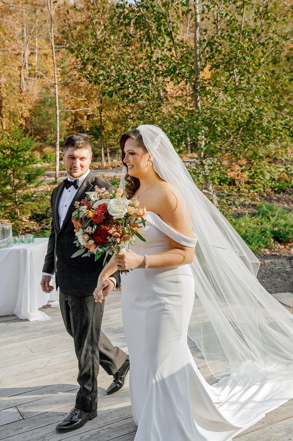 Groom meeting bride halfway during ceremony