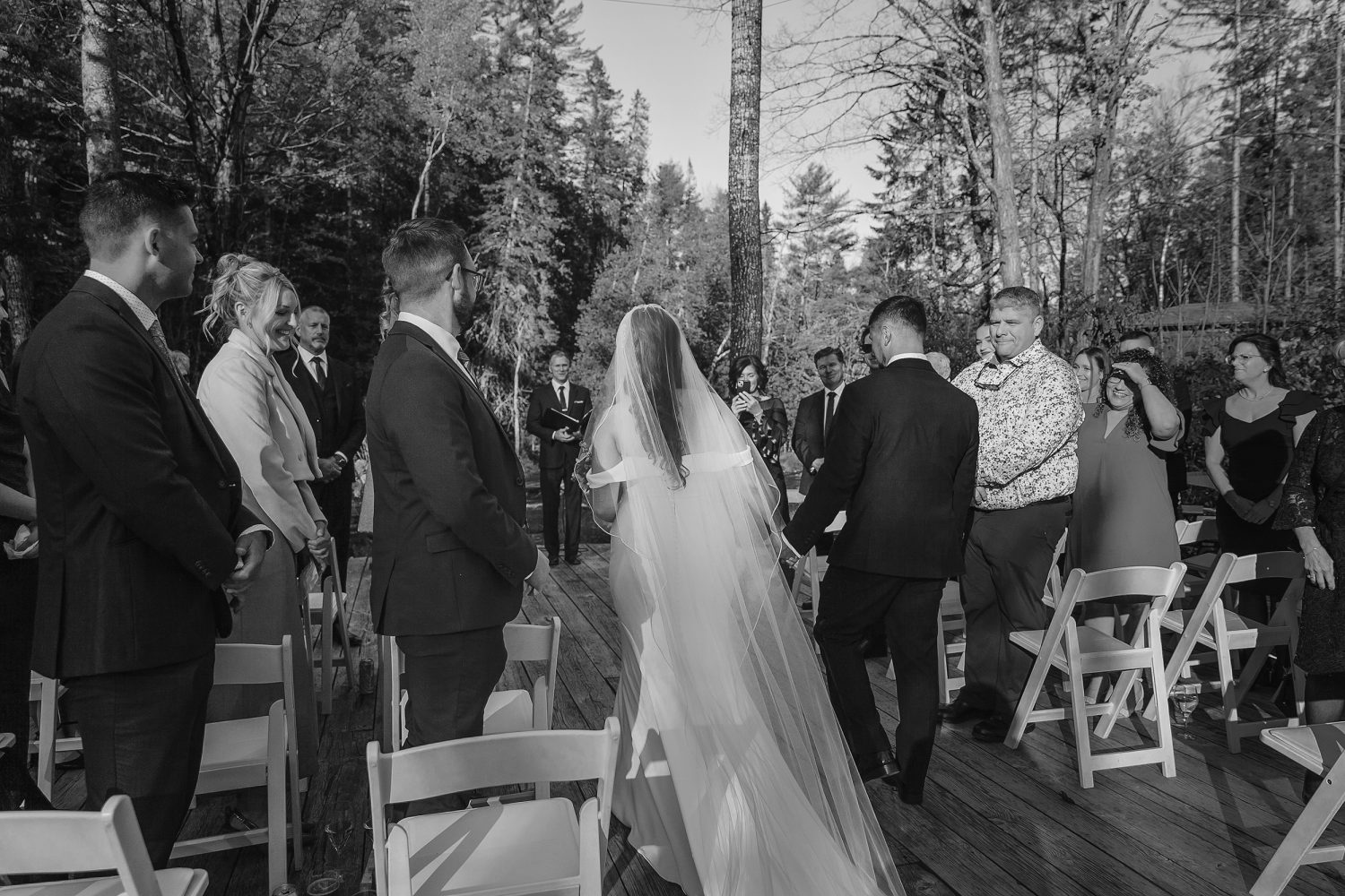 Groom meeting bride halfway during ceremony