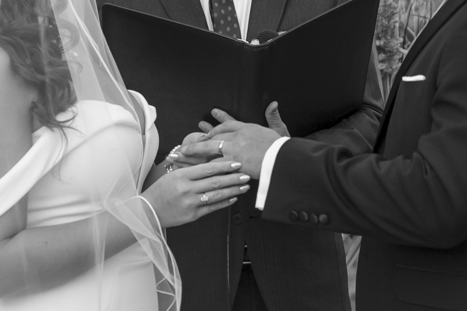 Couple exchanging vows during October wedding