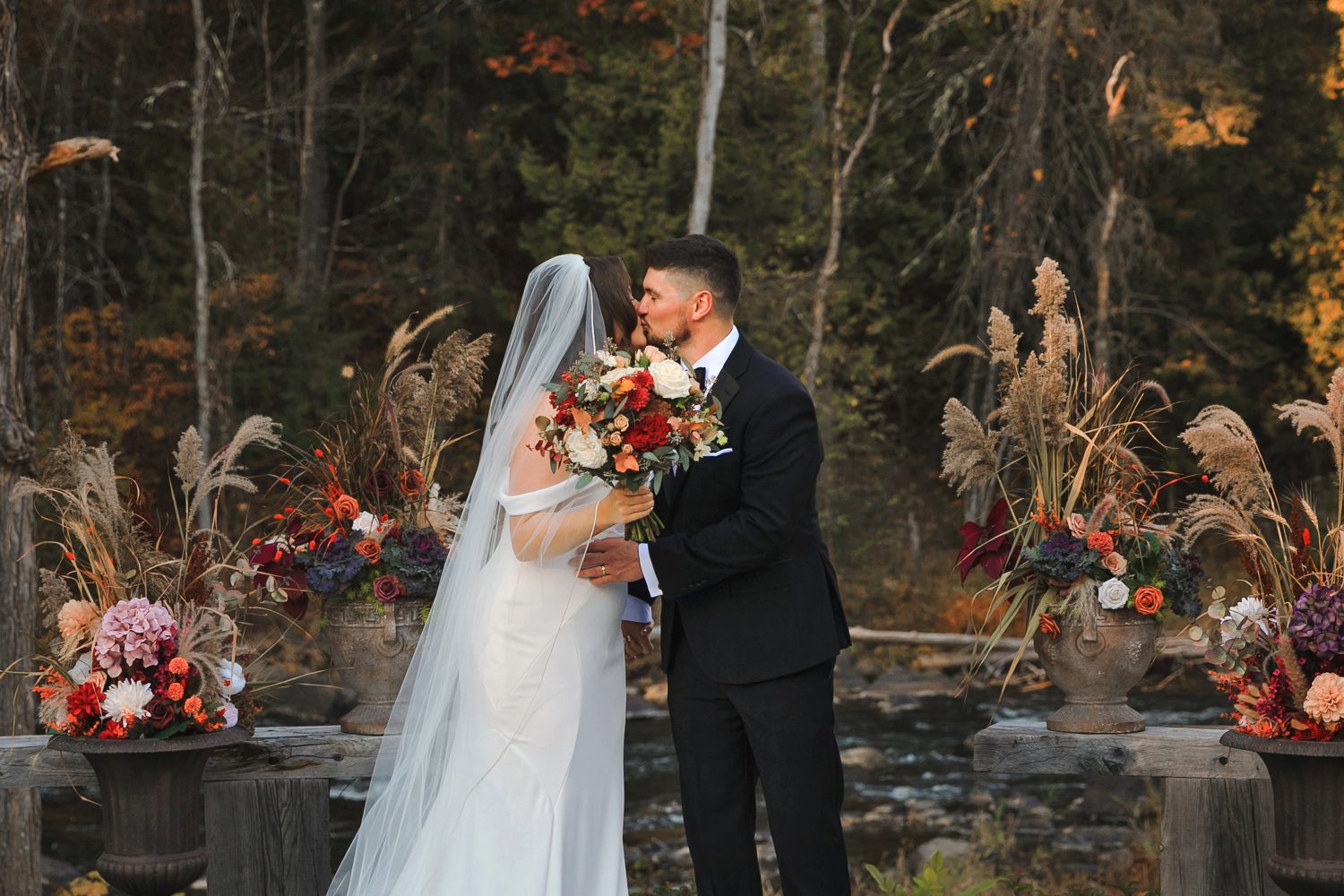 Just married moment under fall leaves