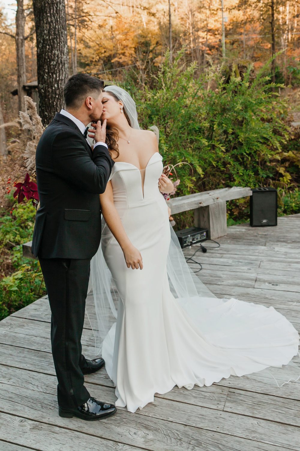 Romantic portrait framed by red and golden leaves