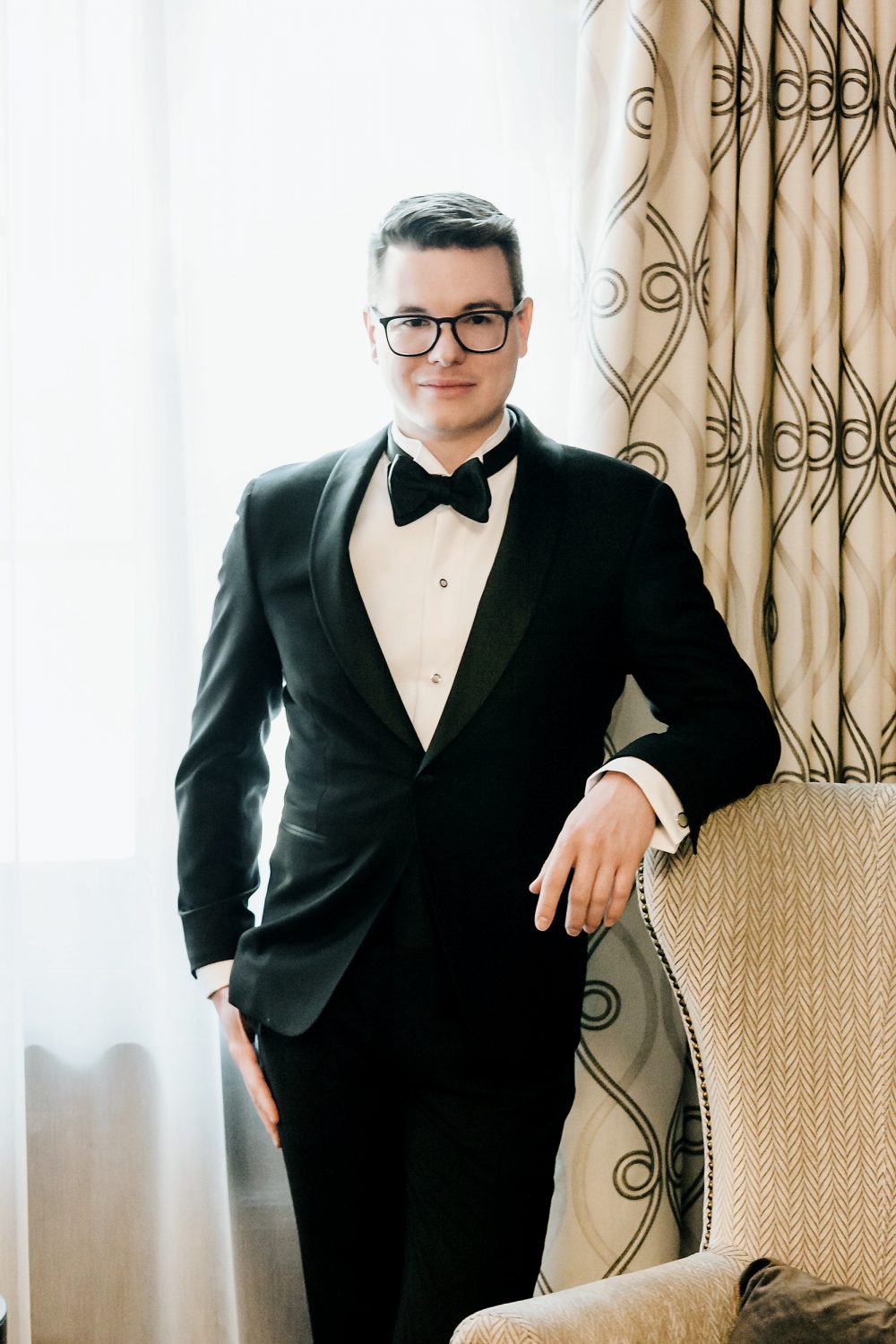 Editorial portrait of groom inside chateau montebello