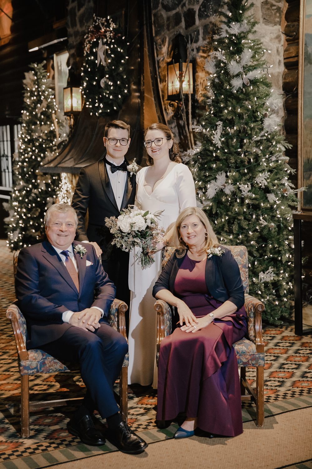 amily portraits at Château Montebello Christmas foyer