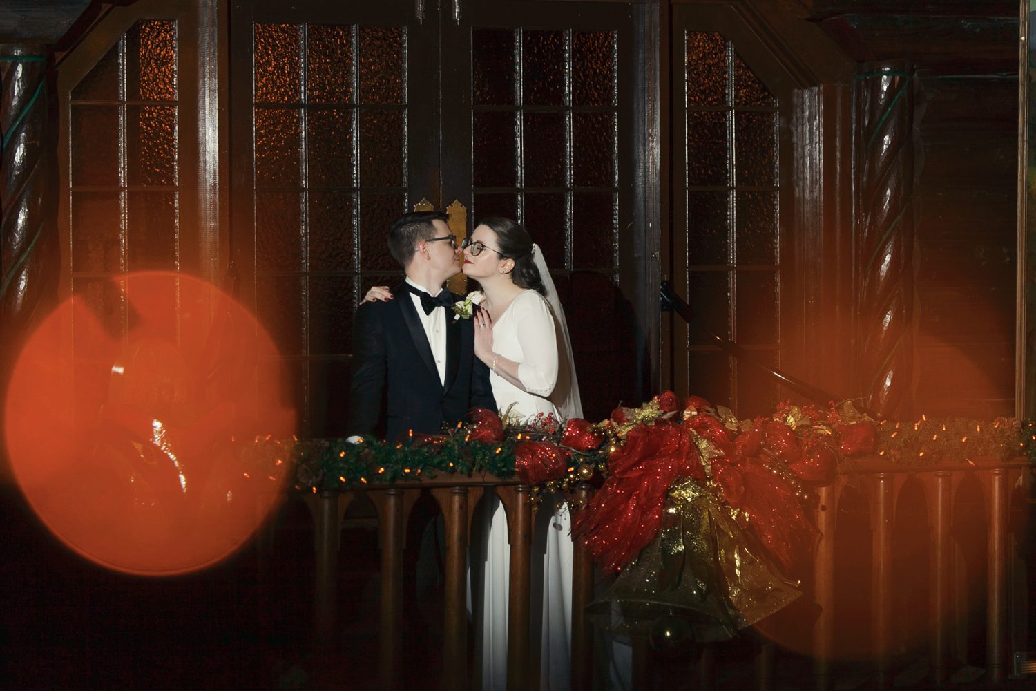Bride and groom photo by fireplace at Chateau Montebello