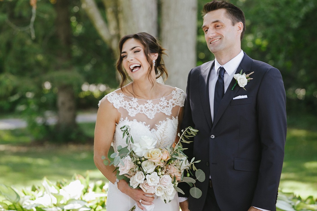 Bridal couple is laughing during ceremony joyous happy photo