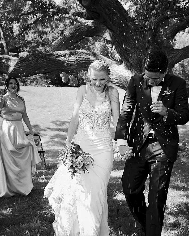 intimate wedding rice throwing at the couple in ottawa experimental farm