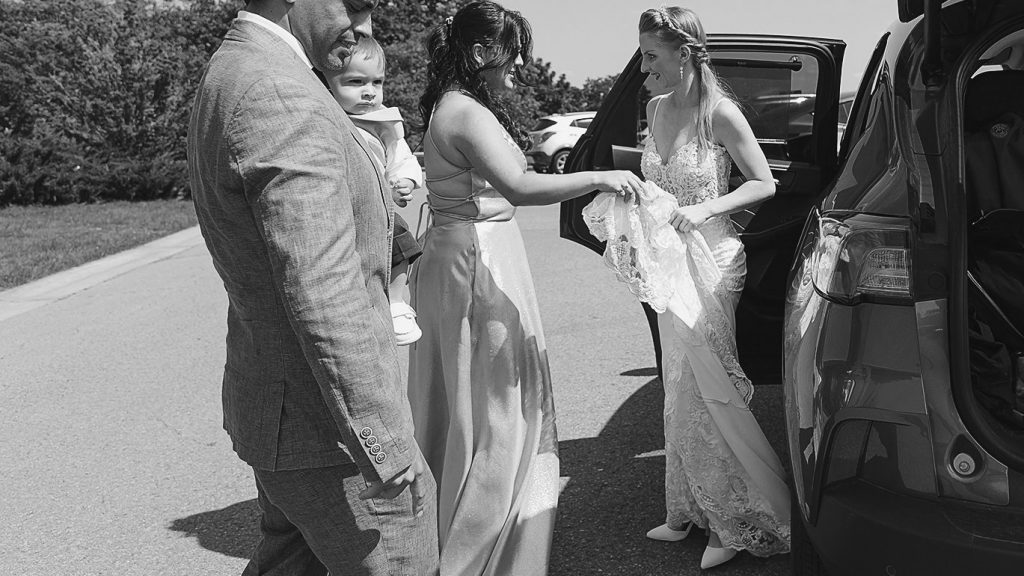 Bride is arriving to her intimate wedding ceremony at Arboretum in the Experimental Farm
