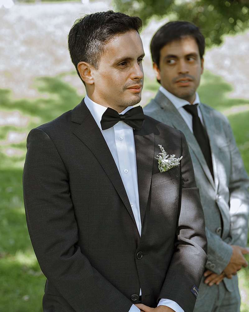 Emotional groom when he sees the bride the first time as she is about to walk down the isle at an intimate ottawa wedding 