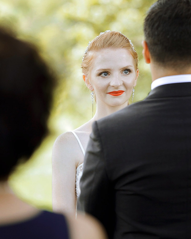 couple is exchanginng vows during an ottawa arboretum intimate wedding ceremony