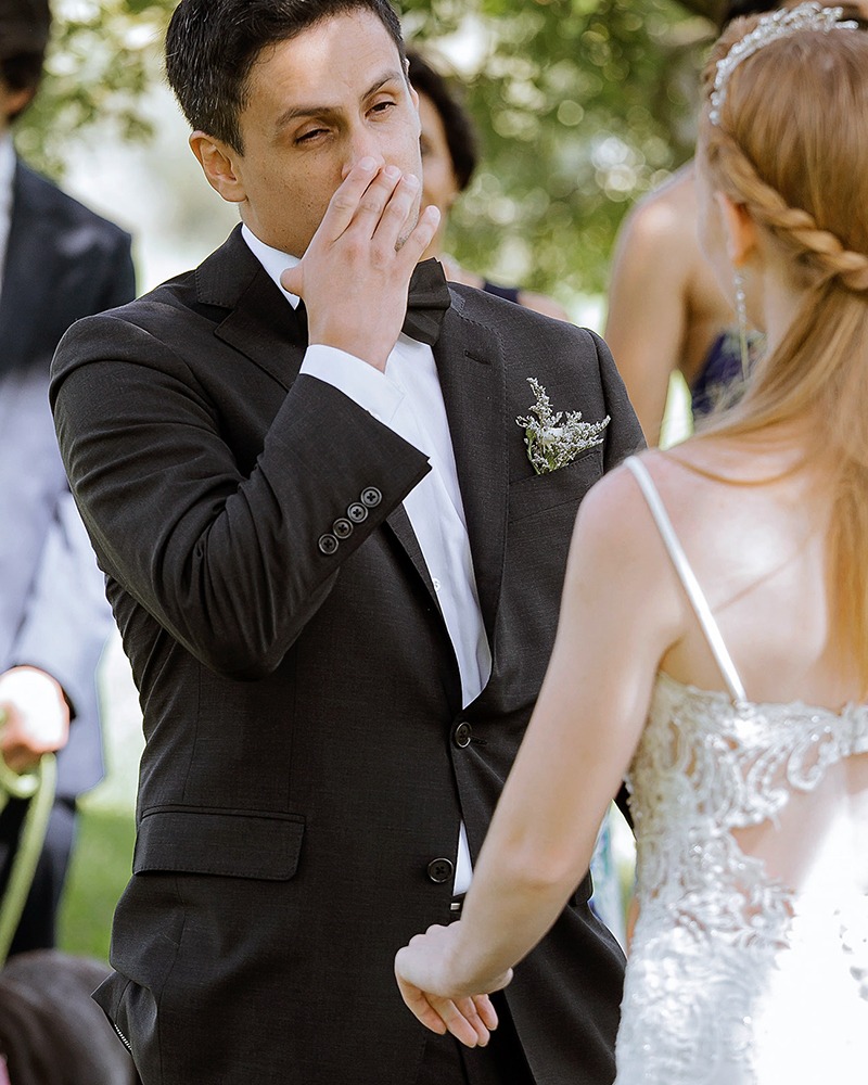 couple is exchanginng vows during an ottawa arboretum intimate wedding ceremony