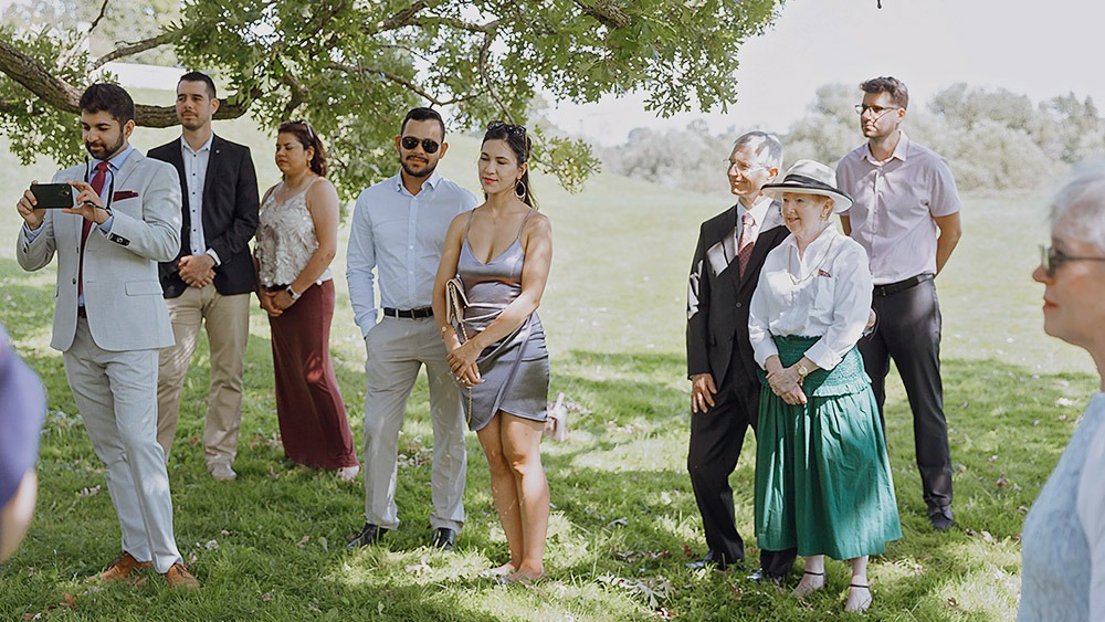 couple is exchanginng vows during an ottawa arboretum intimate wedding ceremony