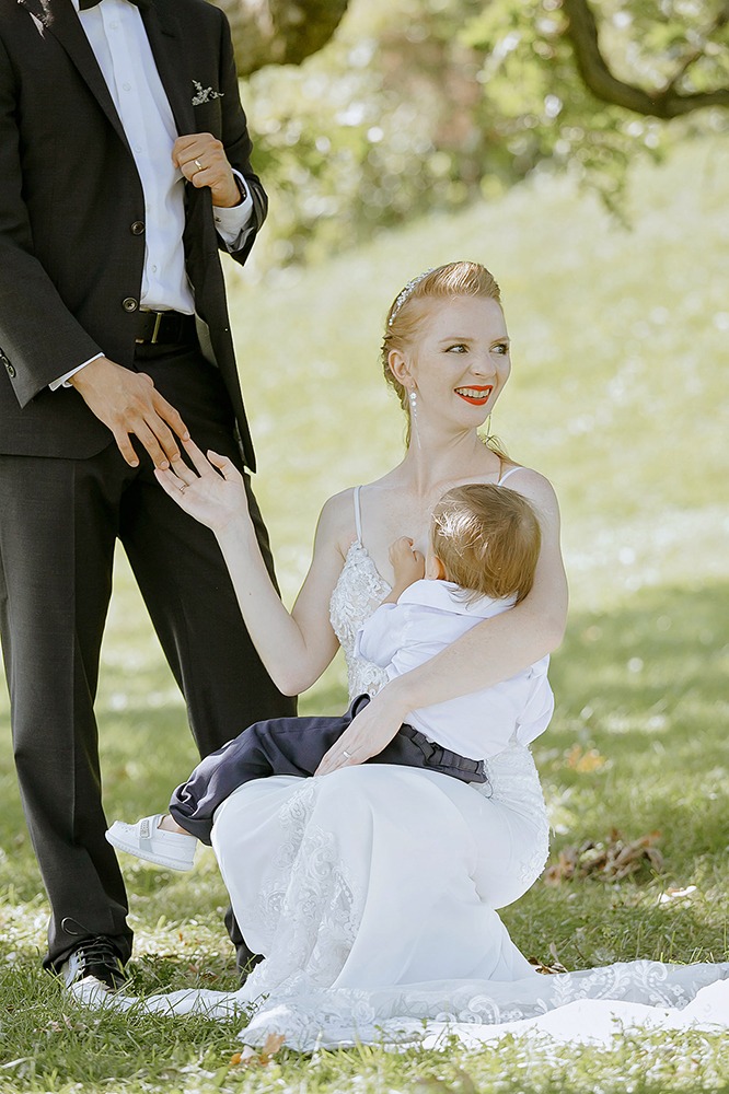 Bride and groom embracing outdoors in the Ottawa Arboretum.