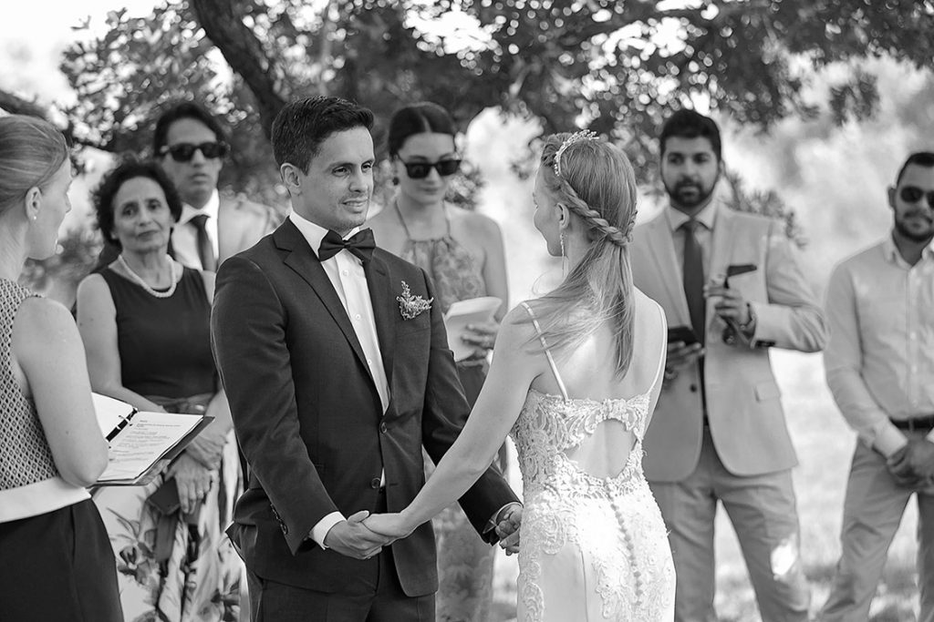 couple is exchanginng vows during an ottawa arboretum intimate wedding ceremony