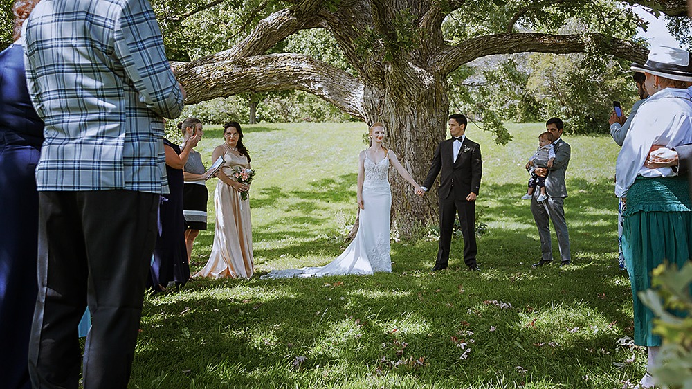 Family gathered for photos after a small wedding ceremony at the Ottawa Arboretum.